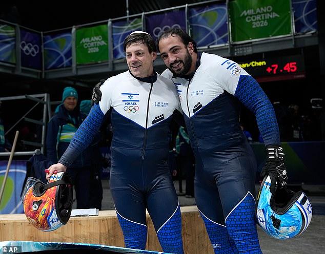 Israel's Adam Edelman And Menachem Chen Arrive At The Finish During A Two Man Bobsled Run At The 2026 Winter Olympics, In Cortina D'ampezzo, Italy, On Tuesday