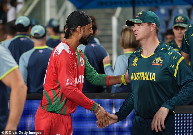 Jatinder Singh Of Oman And Steve Smith Shake Hands After Australia's Commanding Win