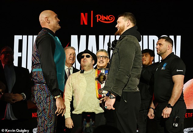 Tyson Fury And His Russian Opponent Size Each Other Up At The Tottenham Hotspur Stadium