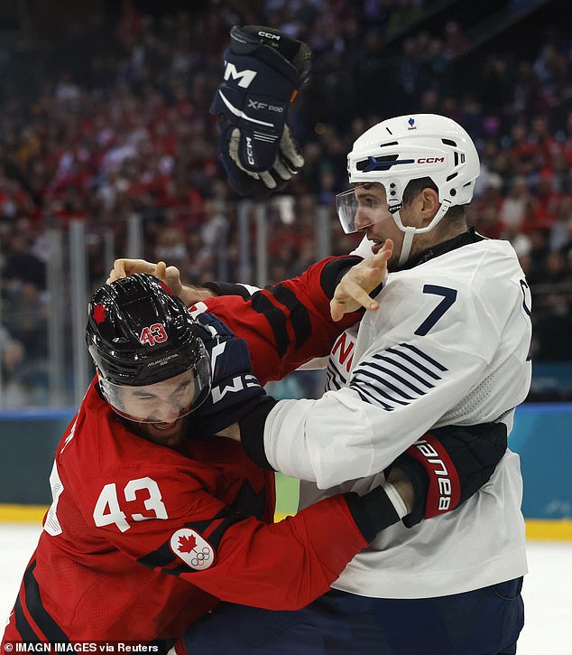 The French Hockey Federation Has Banned Its Own Player, Pierre Crinon (R) For His Actions During And After The First Fight Of The Milan Winter Olympics On Sunday Evening
