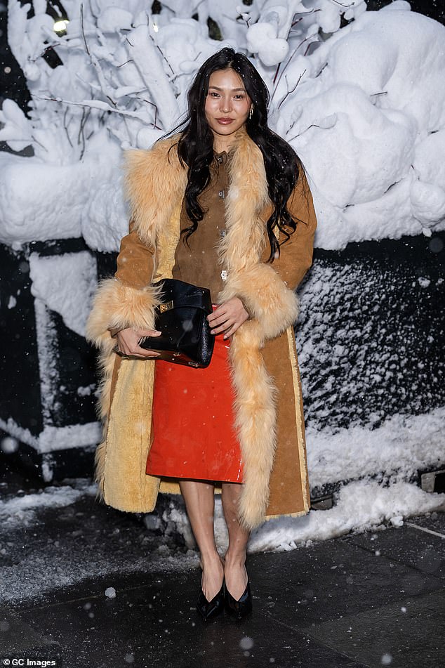 Kim Turned Heads In A Striking Orange Skirt Just Days After Her Winter Olympics Heartbreak