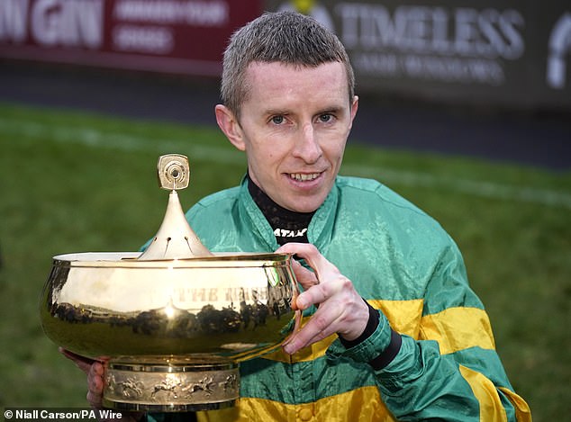 Jockey Mark Walsh With The Irish Gold Cup Trophy At Leopardstown