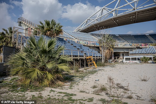 The Stands Of Various Arenas Constructed At Great Cost Now Lie Empty And Rusting