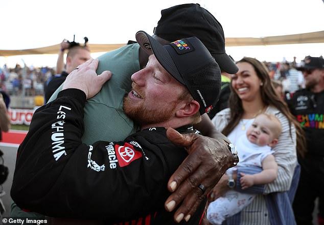 Reddick Embraces Jordan In Austin, Texas On Sunday Following His Third Consecutive Win