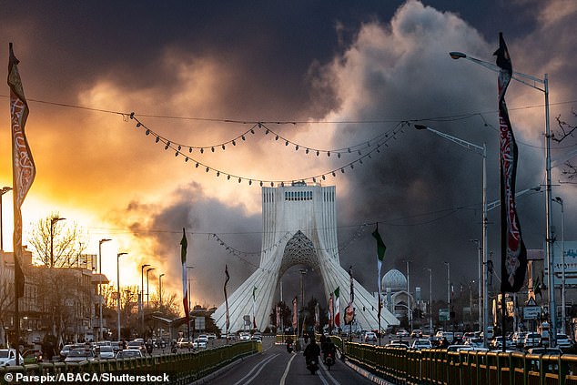 Smoke Rises Following An Explosion From A Strike Near Azadi In Iran As Conflict Rages On