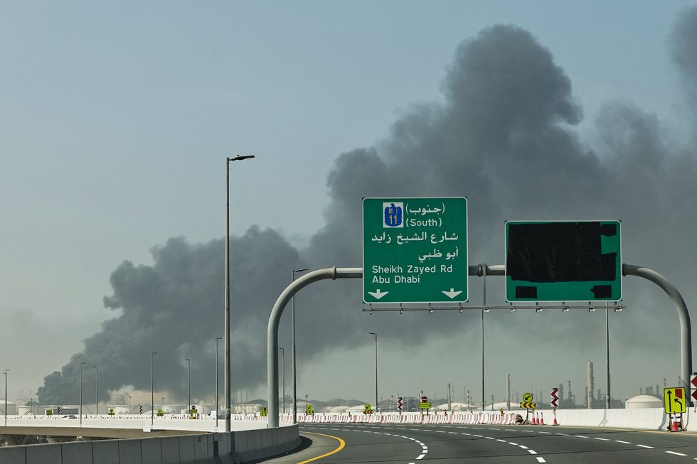 A Plume Of Smoke Rises From The Port Of Jebel Ali Following A Reported Iranian Strike In Dubai