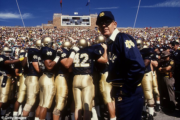 Holtz Leads His Team Onto The Field Prior To The Fighting Irish 52-7 Win Over Purdue In 1988
