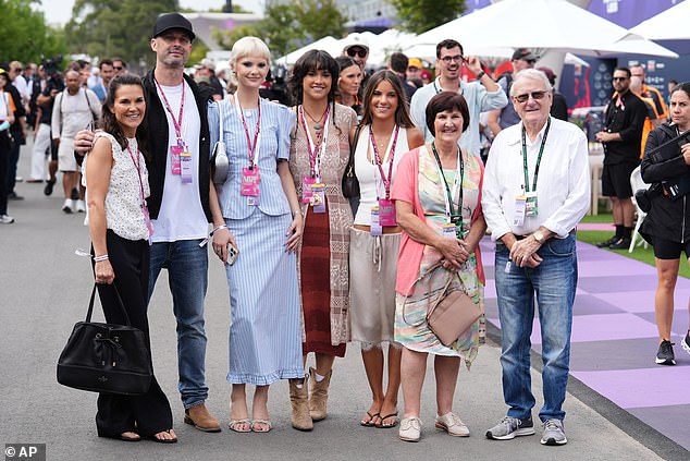 Piastri's Family Pose For A Photo In The F1 Paddock Ahead Of The First Practice Session
