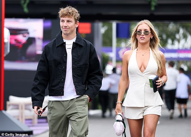 New Zealand's Liam Lawson Arrives In Melbourne With Partner Hannah St. John As He Prepares To Make An Impression With Racing Bulls