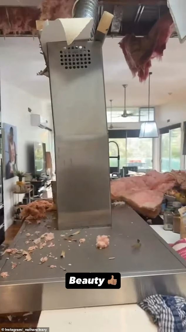 It Appears A Large Metal Appliance - Likely An Air Conditioning Duct - Crashed Through The Ceiling, With The Four-Time Premiership Winner Seeing The Funny Side Of The Incident