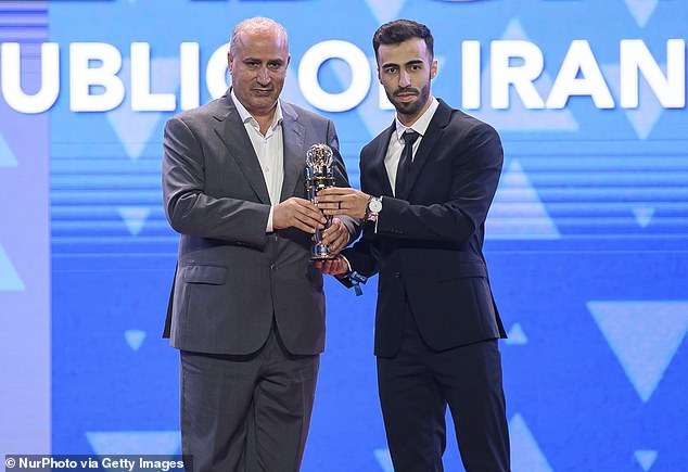 Mehdi Taj (Left) Has Said Iran May Not Compete In This Summer's 'Inappropriate' World Cup