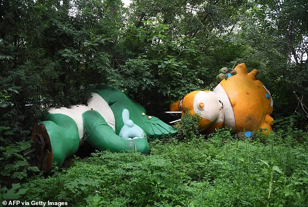 Mascots Used For The Games Are Toppled Over And Symbolic Of The Legacy